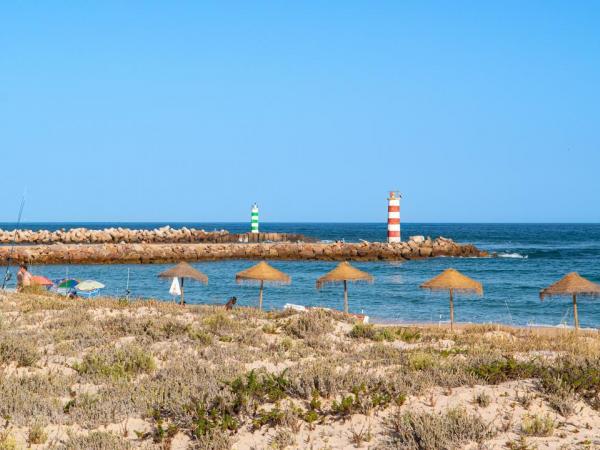 Beach close to Faro with two lighthouses