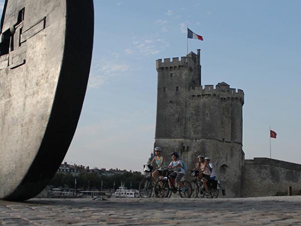 Cyclists in the harbor of La Rochelle