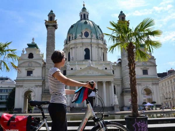 Vienna - Karlskirche church with cyclist