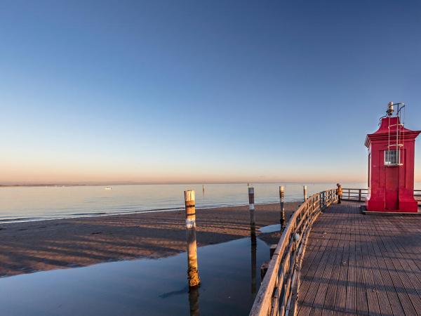 Lighthouse in Lignano at sunset