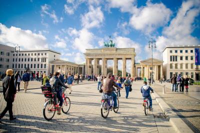 Brandenburg Gate in Berlin with cyclists