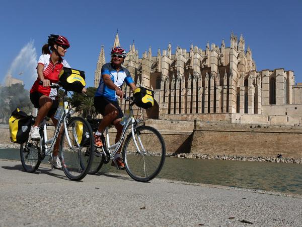 Cycling in front of Palma Cathedral