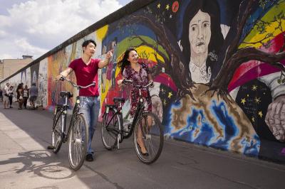 Berlin Wall with cyclists