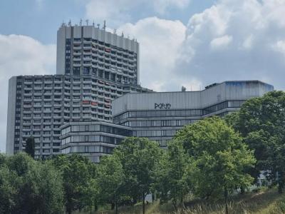Modern building with trees in the front
