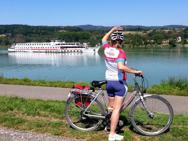 Danube Cycle Path with cyclist and boat