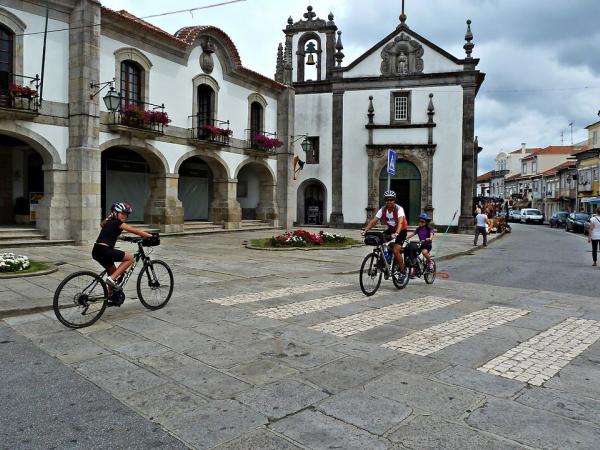 Family cycling in Caminha