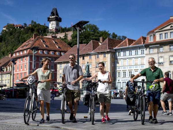 Graz Clock Tower with cyclists