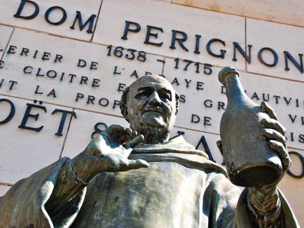 Champagne & Paris by Bike + Boat/ Statue from the monk Dom Perignon at Epernay