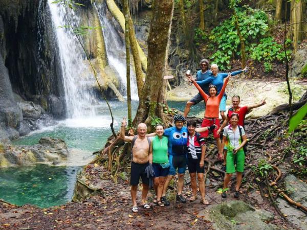 Group at the Waterfall Mata Ai Jitu in Moyo Island