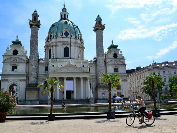 Vienna Karlskirche Church with cyclist