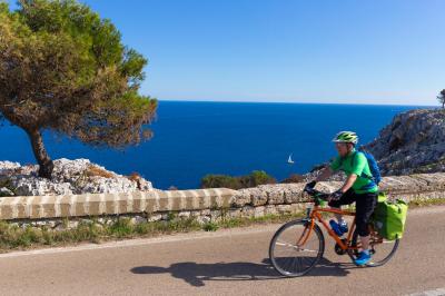 Cyclist on the coast