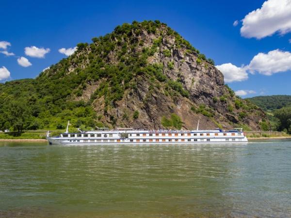 MV Olympia in front of the Loreley