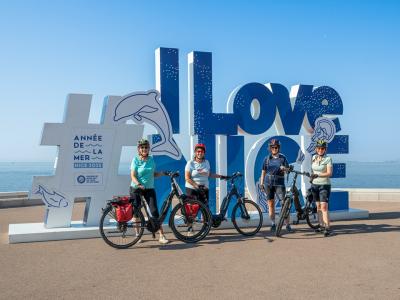 Bike groupin front of the I-Love-Nice-Sign