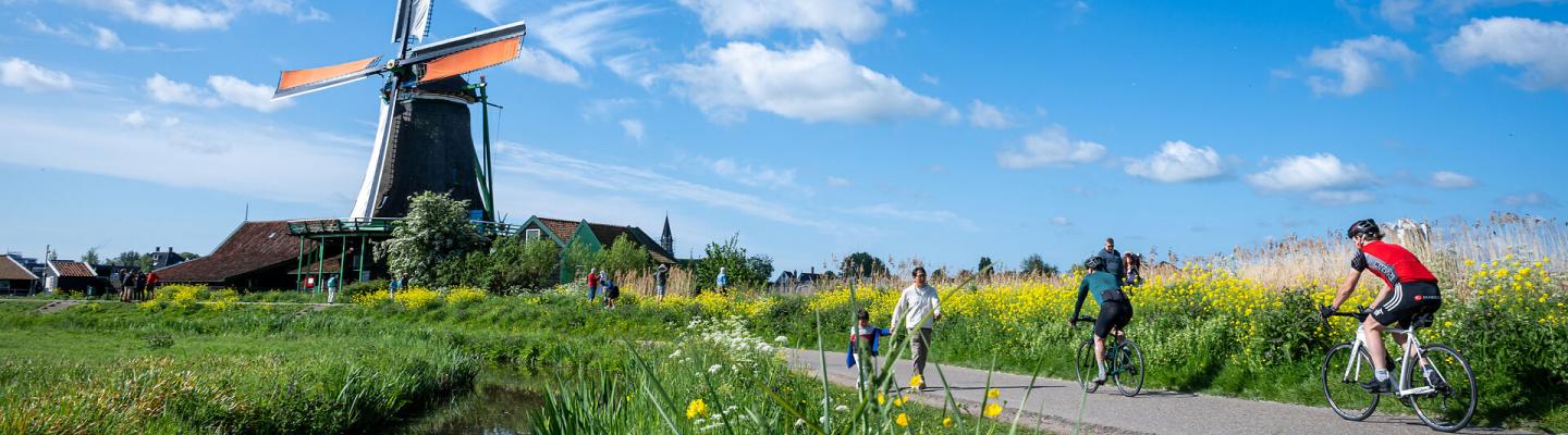 windmills and cyclists - a sustainable vacation