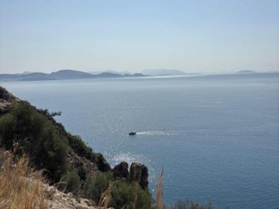 Greek Cliffs with seaview and sailing ship