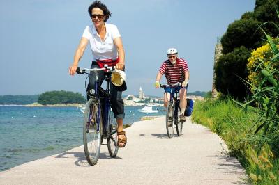 two cyclists in the kvarner bay
