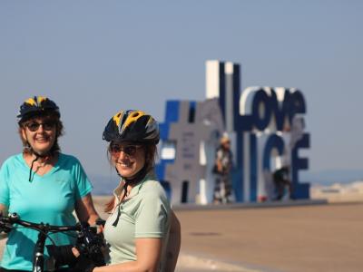 Ingrid and Carina in front of the I-Love-Nice-Schild