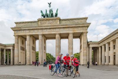 Cyclists in front of the Brandenburg gate