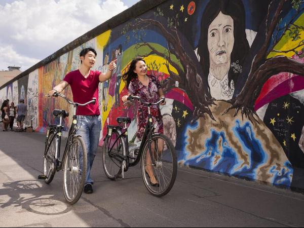 Berlin Wall with cyclists