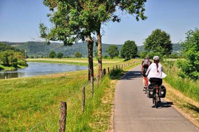 Cyclist along the Weser river
