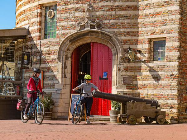 Cyclists in Vlissingen at the old tower