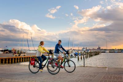 Cyclists in a harbour